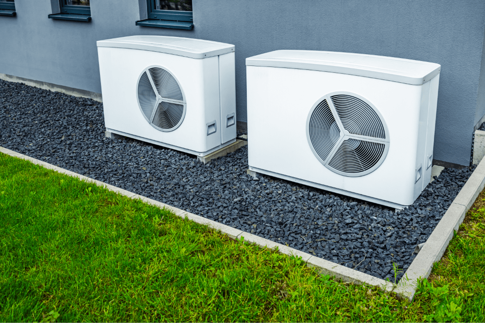 two-air-source-heat-pumps-installed-outside-of-new-2026-03-17-21-29-25-utc